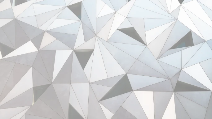 Close-up of a geometric pattern on a building in Madrid.
