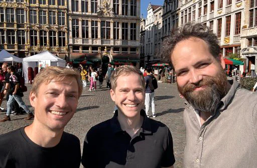 Three members of the kiutra team on the Grand-Place in Brussels at the EIC Pathfinder portfolio kick-off meeting