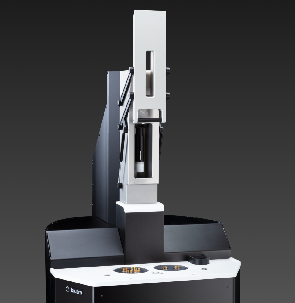 Photo of the top of the L-Type Rapid cryostat showing the open sample loader and the sample cage inside 