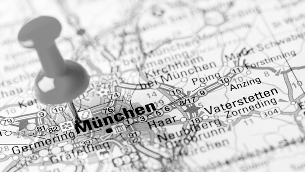 Pin stuck in a map indicating Munich