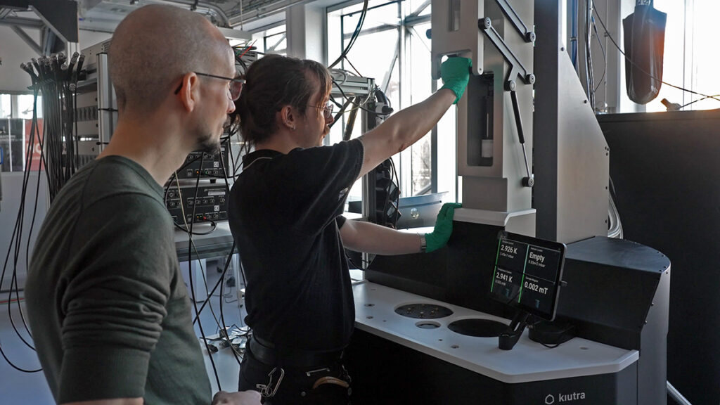 Student opening L-Type Rapid to remove sample after measurement